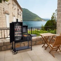 Fleischbrocken Holzkohlegrill Smoker Räucherofen BBQ-Grill Schwarz 10 Fleischbrocken Holzkohlegrill Smoker Räucherofen BBQ-Grill Schwarz -Haushaltsgerätegeschäft 10030554 yy 0002 ambient Klarstein Fleischbrocken Holzkohlegrill Stahl